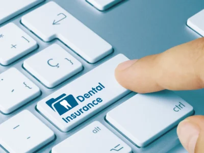 clicking dental insurance button on a keyboard