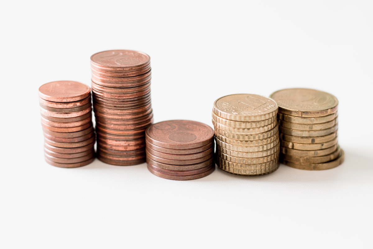 Stacked coins representing saving up for the cost of wisdom teeth removal